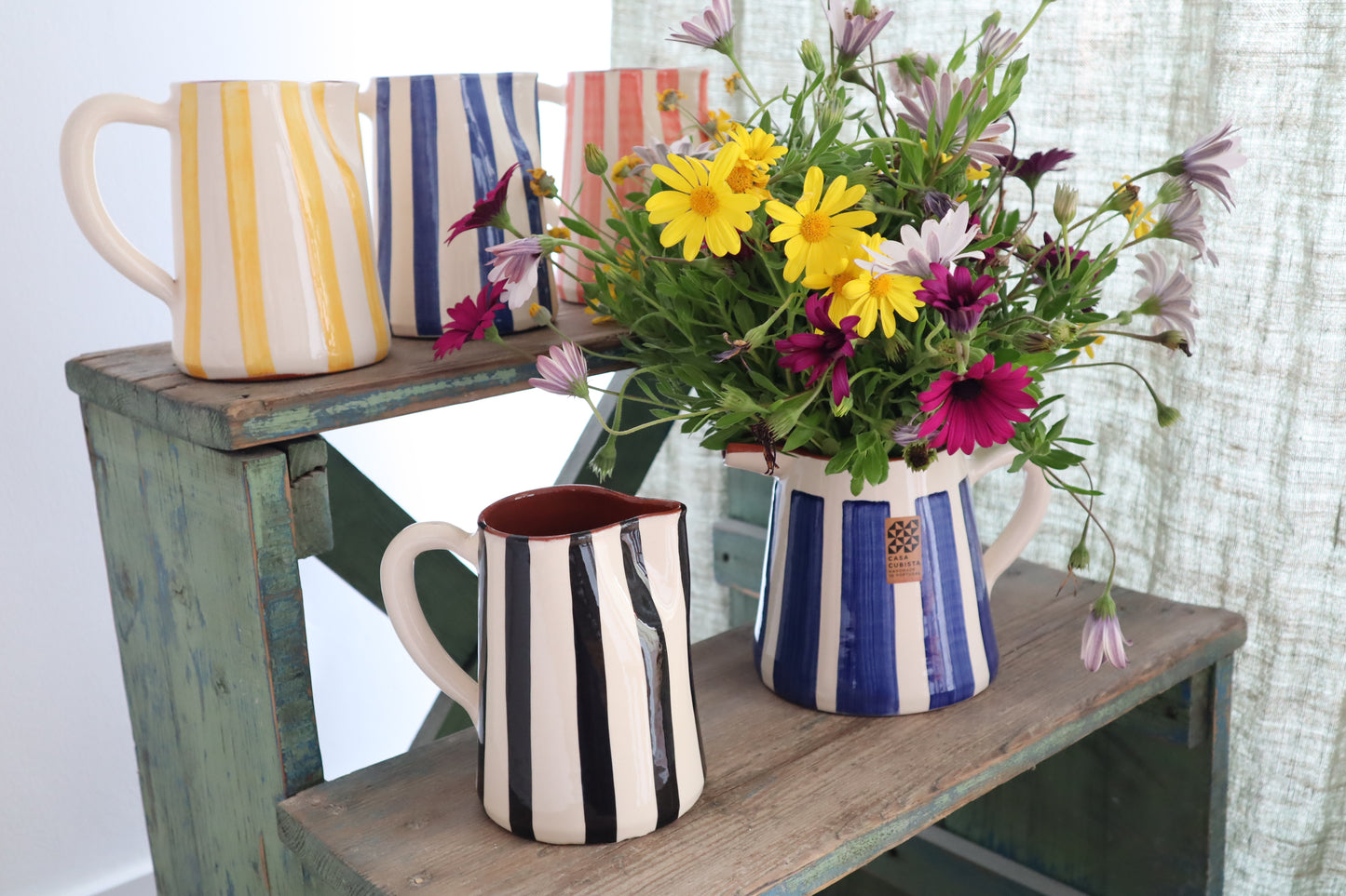 Krug | stripe | blau gelb schwarz rot